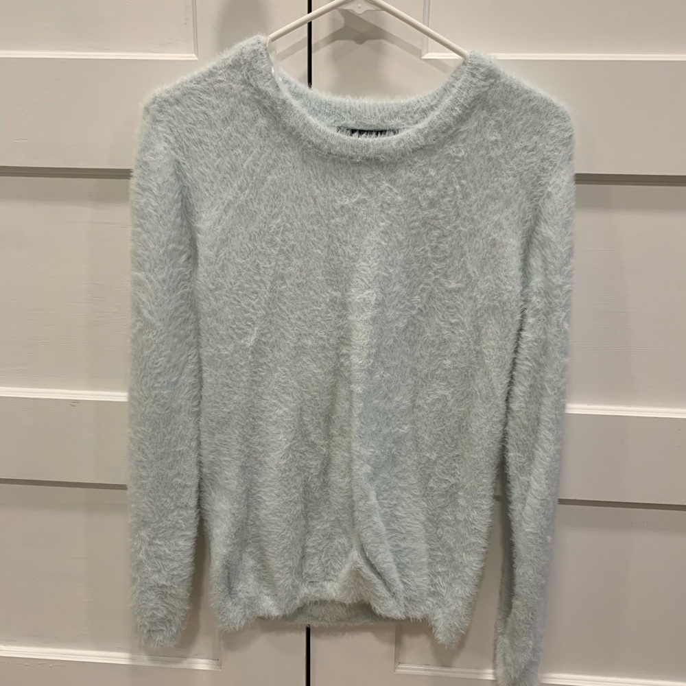 Light blue sweater